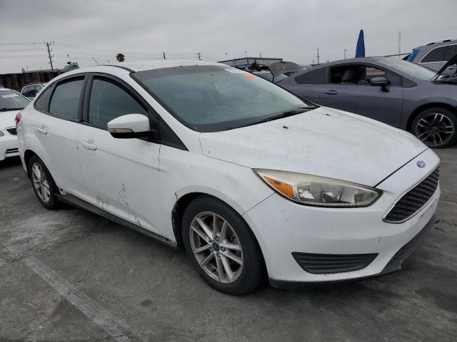 Снимка 4 от търг – 2016 FORD FOCUS SE с VIN 1FADP3F22GL270420