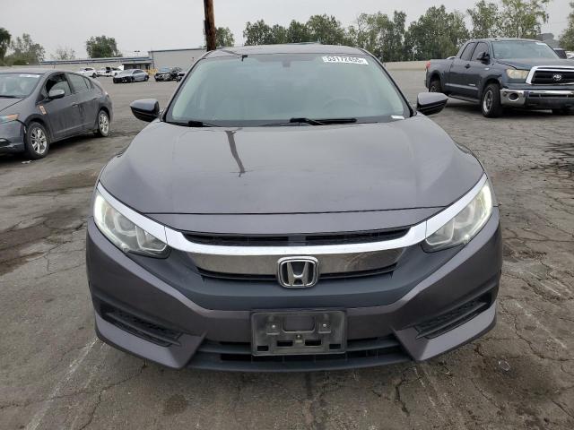 Photo 5 from auction – 2017 HONDA CIVIC LX with VIN 2HGFC2F51HH574826
