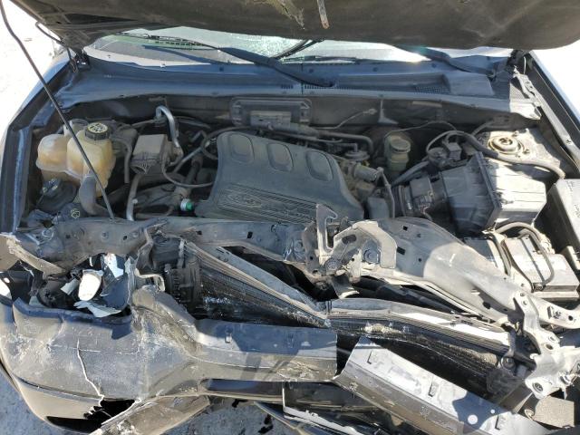 Photo 12 from auction – 2004 FORD ESCAPE LIM with VIN 1FMCU94184KB05982