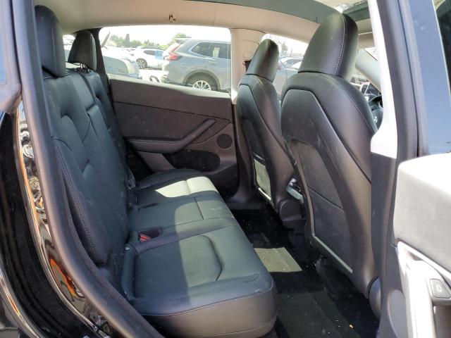 Photo 11 from auction – 2023 TESLA MODEL Y with VIN 7SAYGDEE9PA073857