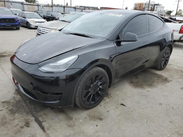 TESLA MODEL Y 2023 with VIN 7SAYGDEE7PA143291 - Photo from auction