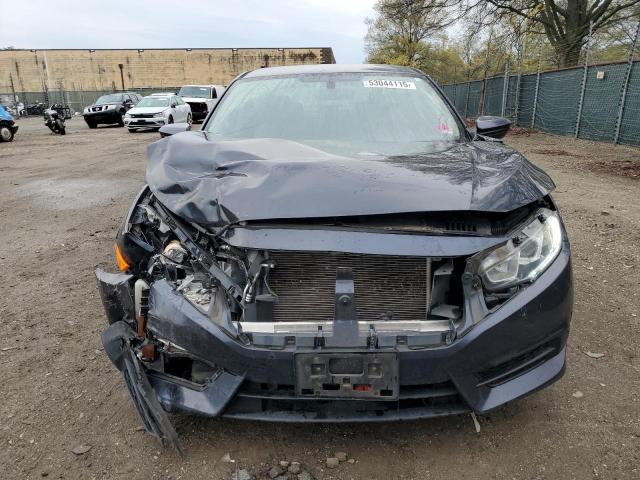 Photo 5 from auction – 2018 HONDA CIVIC LX with VIN 2HGFC2F52JH523468