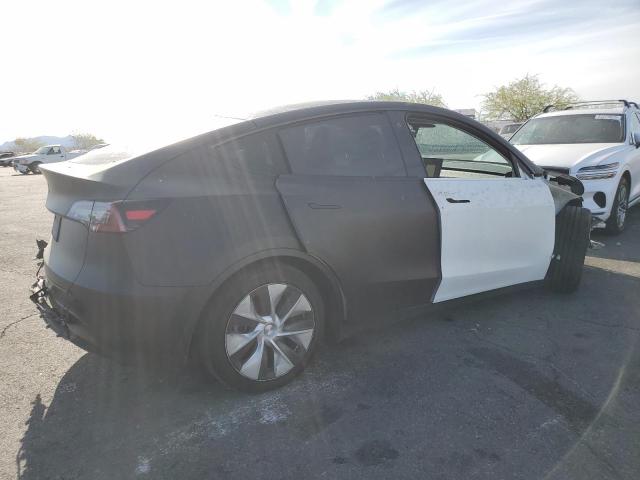 Photo 3 from auction – 2023 TESLA MODEL Y with VIN 7SAYGAEE4PF670755
