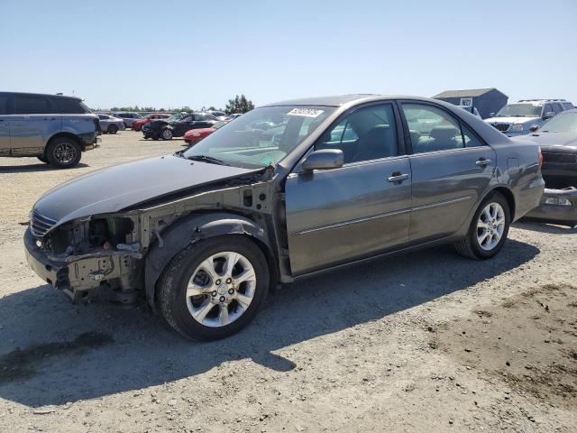 TOYOTA CAMRY LE 2005 with VIN 4T1BF30K15U609880 - Photo from auction