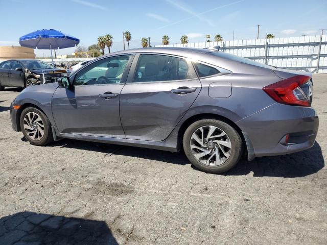 Photo 2 from auction – 2017 HONDA CIVIC EX with VIN 2HGFC2F75HH556010