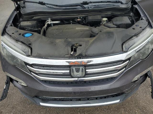 Photo 12 from auction – 2018 HONDA PILOT ELIT with VIN 5FNYF6H04JB045163