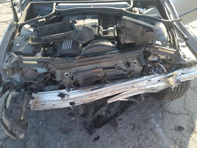 Photo 11 from auction – 2004 BMW 325 IS SUL with VIN WBAAZ33494KP86902