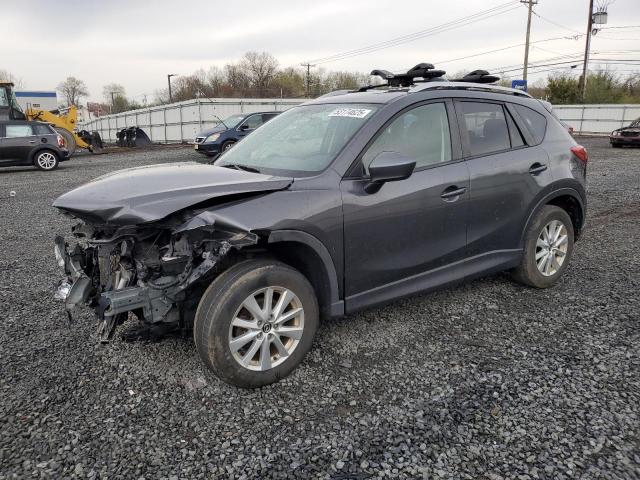 MAZDA CX-5 TOURI 2014 with VIN JM3KE4CY1E0390074 - Photo from auction