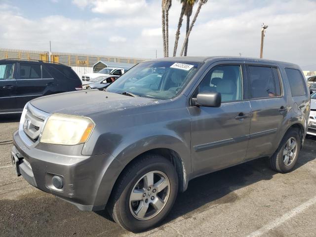 HONDA PILOT 2011 with VIN 5FNYF3H2XBB027073 - Photo from auction