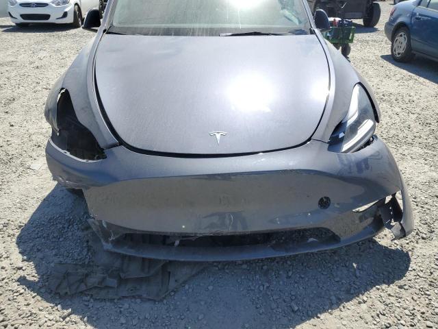 Photo 11 from auction – 2023 TESLA MODEL Y with VIN 7SAYGAEEXPF764896