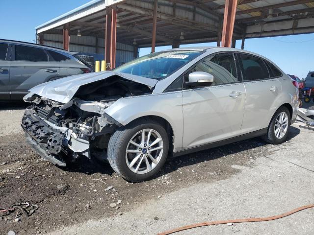 FORD FOCUS SE 2017 with VIN 1FADP3F28HL338298 - Photo from auction