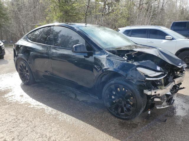 Photo 4 from auction – 2021 TESLA MODEL Y with VIN 5YJYGAEE0MF144423