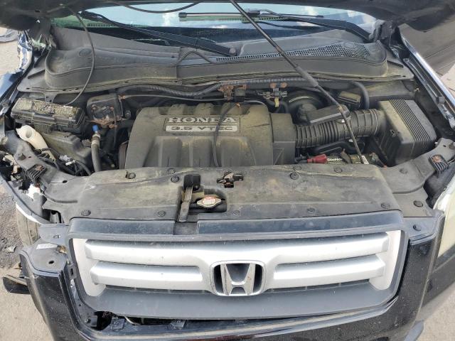 Photo 11 from auction – 2006 HONDA PILOT EX with VIN 2HKYF18536H554183