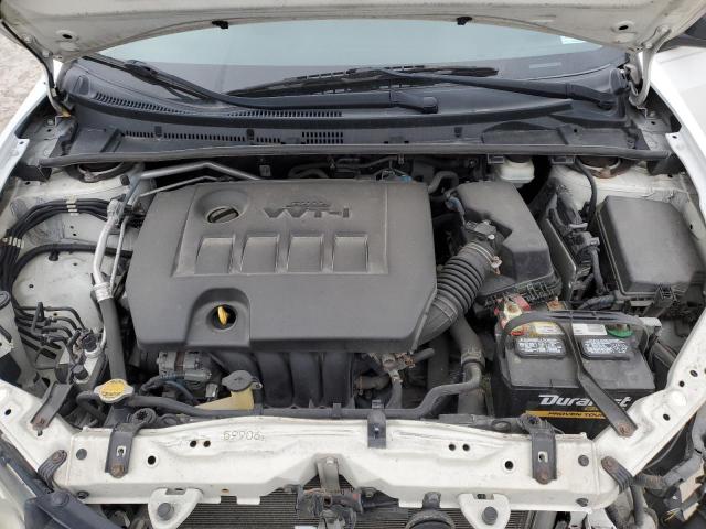 Photo 11 from auction – 2014 TOYOTA COROLLA L with VIN 2T1BURHEXEC036714