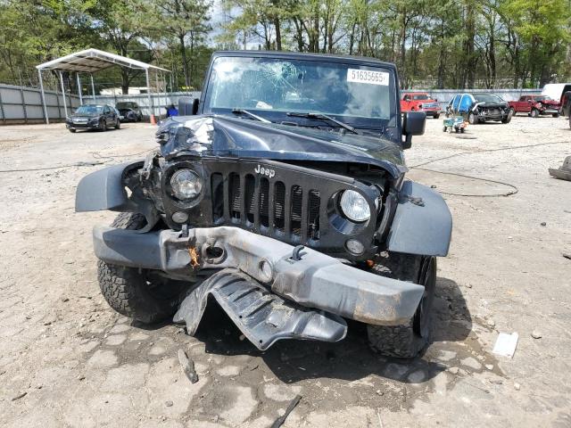 Photo 5 from auction – 2015 JEEP WRANGLER U with VIN 1C4BJWDG5FL693655