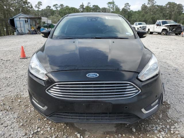 Photo 5 from auction – 2016 FORD FOCUS TITA with VIN 1FADP3N25GL215901