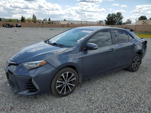 TOYOTA COROLLA L 2017 with VIN 5YFBURHE2HP663184 - Photo from auction