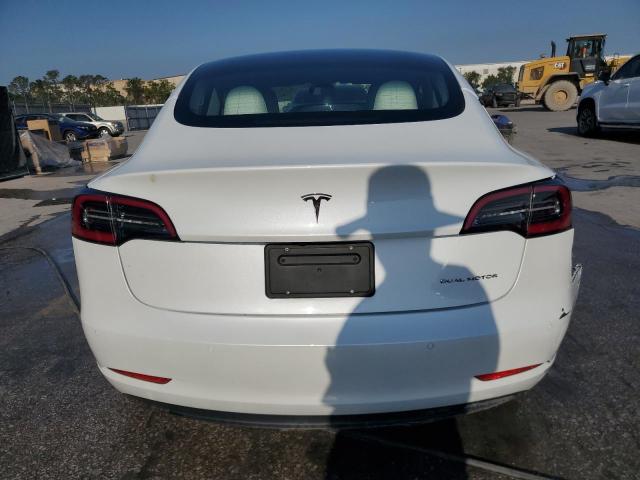 Photo 6 from auction – 2022 TESLA MODEL 3 with VIN 5YJ3E1EB2NF199141