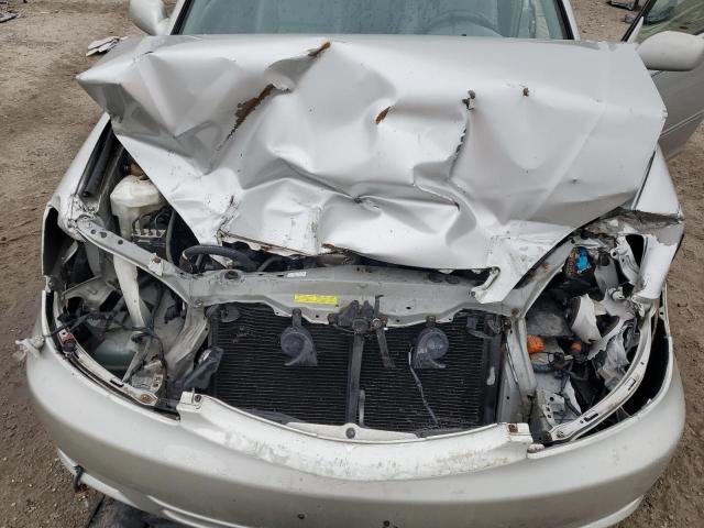 Photo 11 from auction – 2004 TOYOTA CAMRY LE with VIN 4T1BE30K34U290211