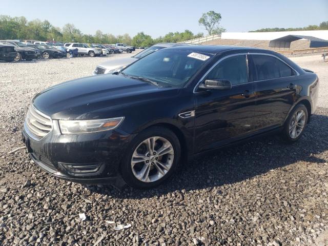 FORD TAURUS SEL 2014 with VIN 1FAHP2E92EG159897 - Photo from auction