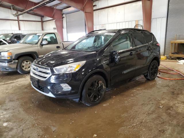 FORD ESCAPE SE 2018 with VIN 1FMCU9GDXJUB75957 - Photo from auction