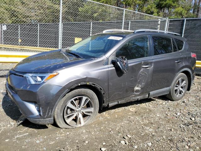 TOYOTA RAV4 XLE 2017 with VIN JTMRFREV0HJ109577 - Photo from auction