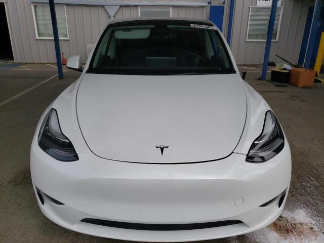 Photo 5 from auction – 2022 TESLA MODEL Y with VIN 7SAYGAEE9NF384400