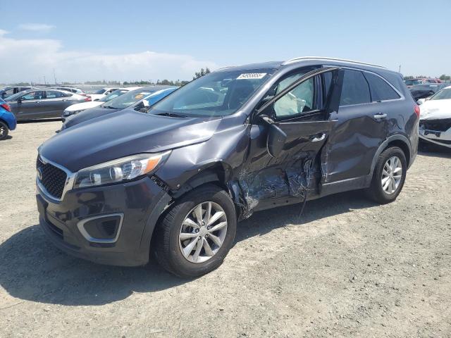 KIA SORENTO LX 2016 with VIN 5XYPGDA38GG001671 - Photo from auction