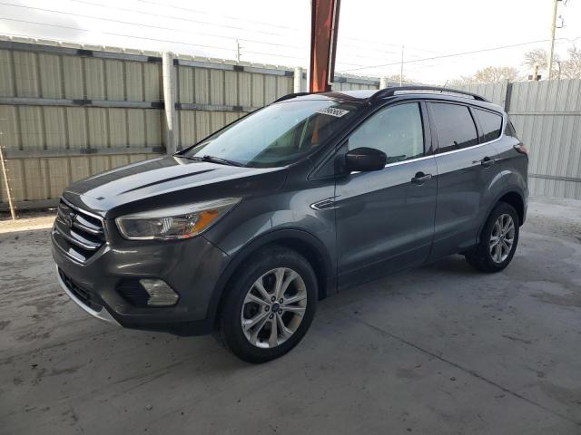 FORD ESCAPE SE 2018 with VIN 1FMCU9GD5JUA32155 - Photo from auction