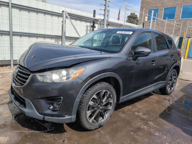 MAZDA CX-5 GT 2016 with VIN JM3KE4DY8G0612031 - Photo from auction