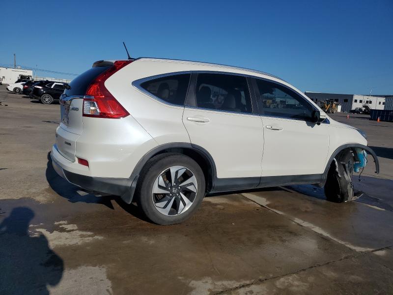 Photo 3 from auction – 2015 HONDA CR-V TOURI with VIN 5J6RM4H97FL076855
