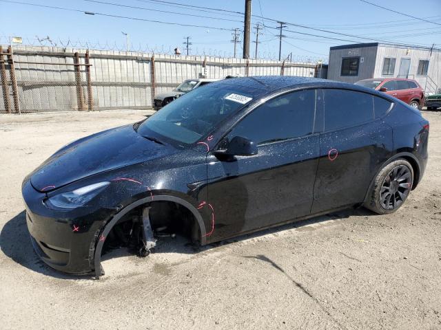 TESLA MODEL Y 2023 with VIN 7SAYGDEE9PA073857 - Photo from auction