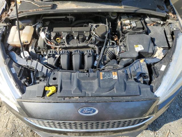 Photo 11 from auction – 2016 FORD FOCUS S with VIN 1FADP3E23GL275563