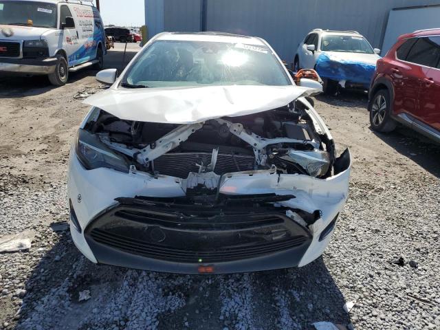 Photo 5 from auction – 2017 TOYOTA COROLLA L with VIN 5YFBURHE9HP710534