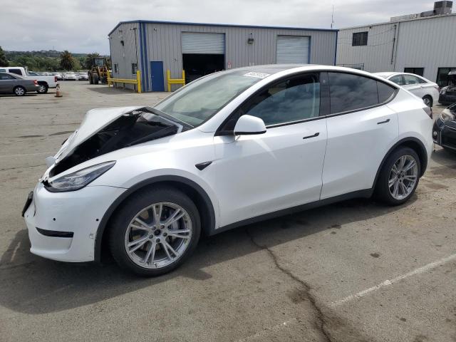 TESLA MODEL Y 2022 with VIN 7SAYGAEE7NF506140 - Photo from auction