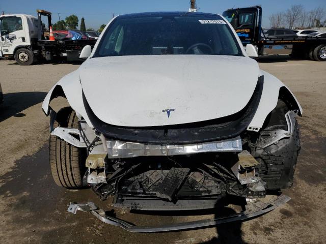 Photo 5 from auction – 2022 TESLA MODEL Y with VIN 7SAYGDEE8NF554957