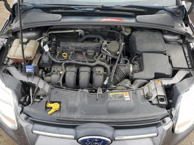 Снимка 11 от търг – 2013 FORD FOCUS S с VIN 1FADP3E22DL330158