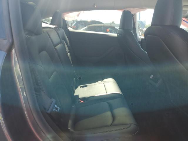 Photo 11 from auction – 2023 TESLA MODEL Y with VIN 7SAYGDEE7PA131500