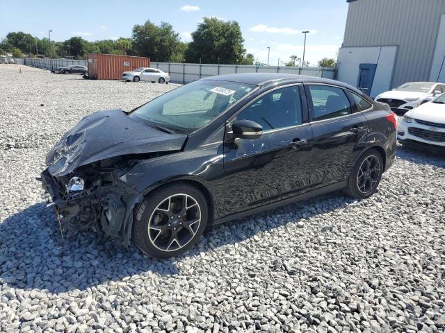 FORD FOCUS SE 2014 with VIN 1FADP3F20EL227594 - Photo from auction