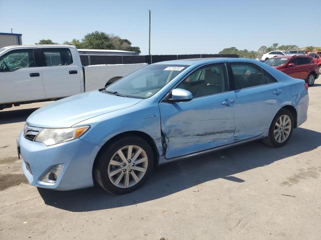 TOYOTA CAMRY HYBR 2012 with VIN 4T1BD1FK0CU043063 - Photo from auction