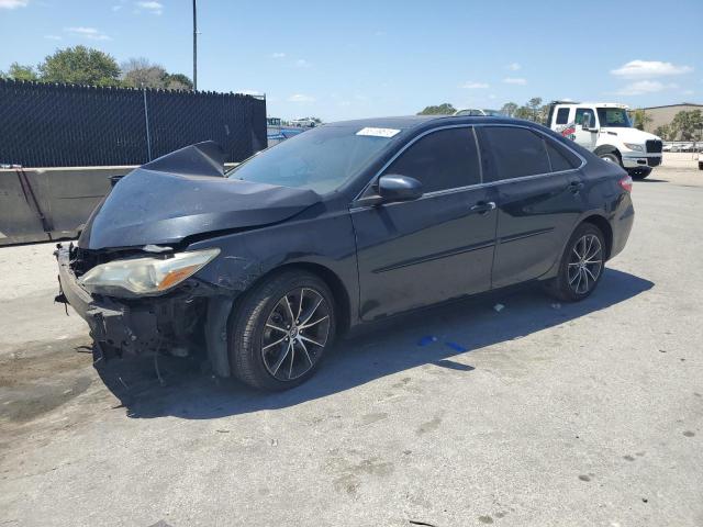 TOYOTA CAMRY LE 2017 with VIN 4T1BF1FK6HU618879 - Photo from auction