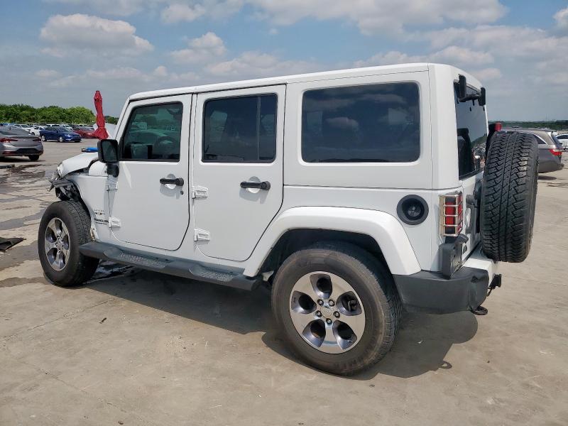 Photo 2 from auction – 2016 JEEP WRANGLER U with VIN 1C4BJWEG0GL141769