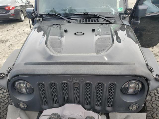 Photo 11 from auction – 2015 JEEP WRANGLER S with VIN 1C4AJWBG8FL584959