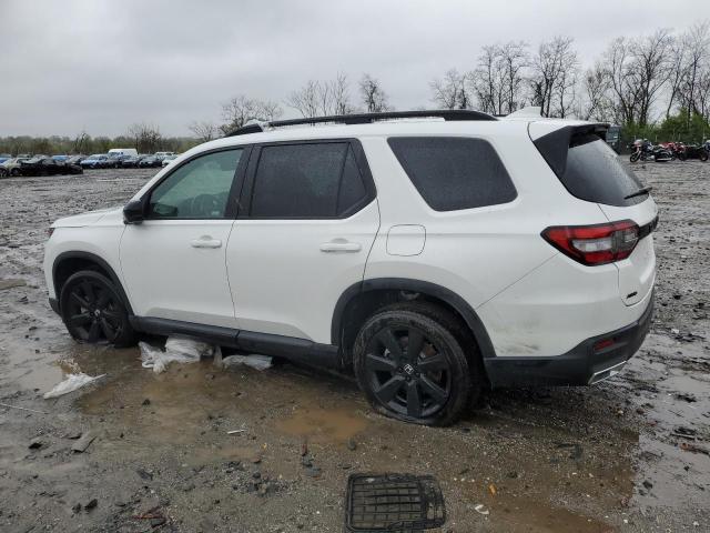 Photo 2 from auction – 2023 HONDA PILOT BLAC with VIN 5FNYG1H32PB015422