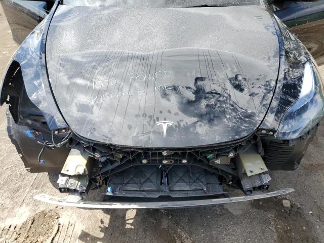 Photo 11 from auction – 2024 TESLA MODEL Y with VIN 7SAYGDEE0RF202381