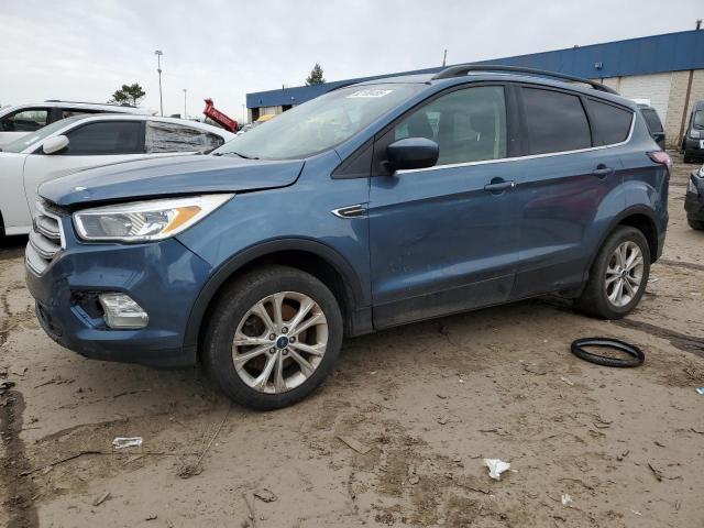 FORD ESCAPE SE 2018 with VIN 1FMCU9GDXJUC17608 - Photo from auction