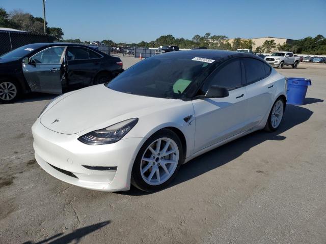TESLA MODEL 3 2021 with VIN 5YJ3E1EA9MF838301 - Photo from auction