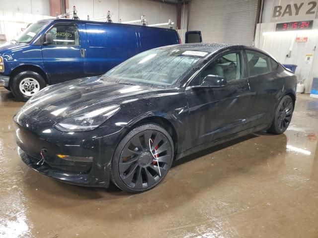 TESLA MODEL 3 2022 with VIN 5YJ3E1EC7NF340634 - Photo from auction