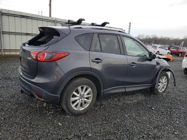 Photo 3 from auction – 2014 MAZDA CX-5 TOURI with VIN JM3KE4CY1E0390074