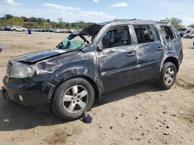 HONDA PILOT EXLN 2011 with VIN 5FNYF4H79BB070918 - Photo from auction